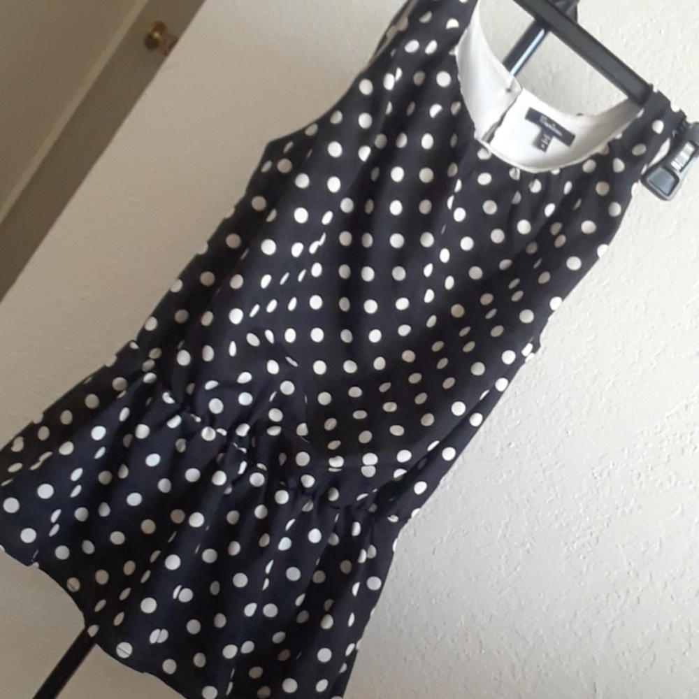 Black polka dot shirt